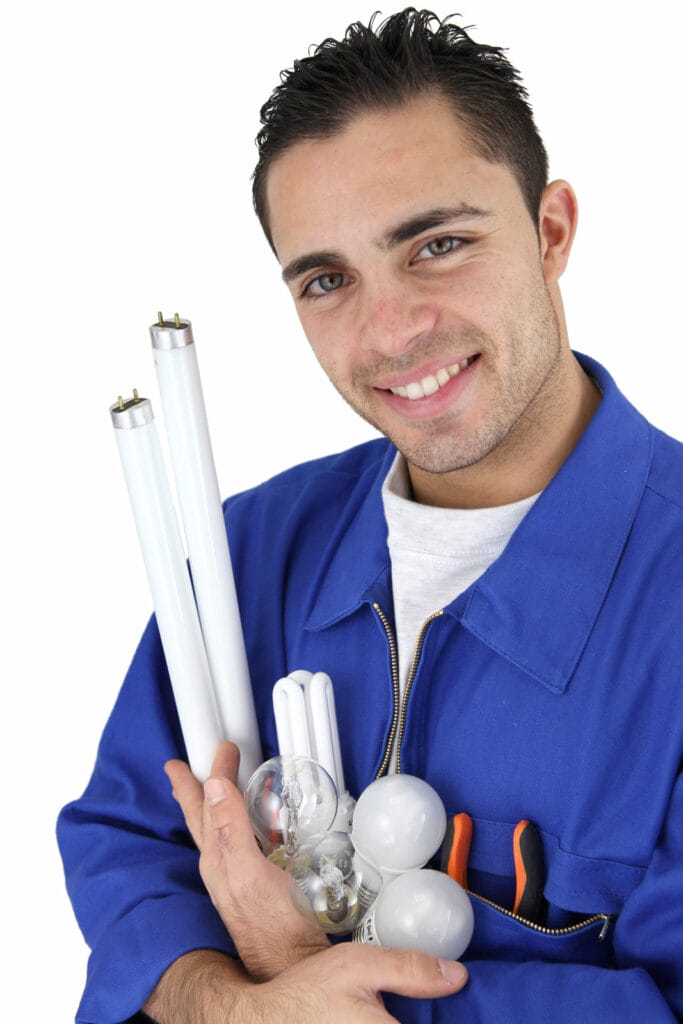 Electrician With A Variety Of Light Bulbs 