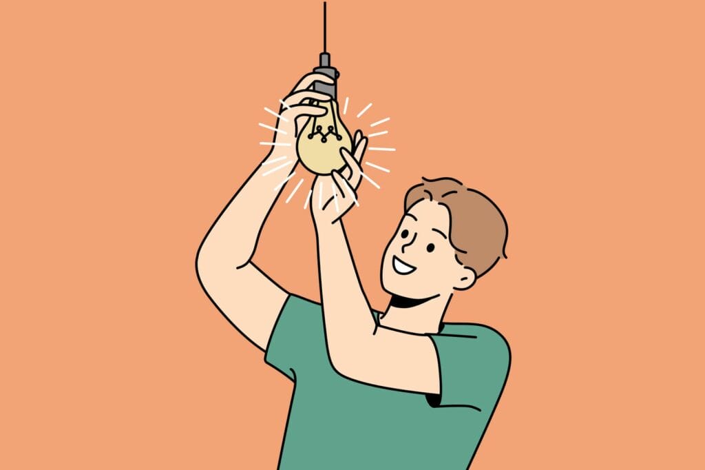 Smiling Man Screwing Lightbulb 
